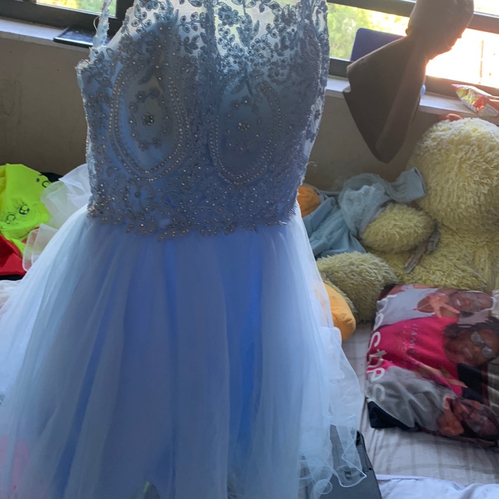 baby blue puffy tulle dress with gems on the bodice comfortable and beautiful